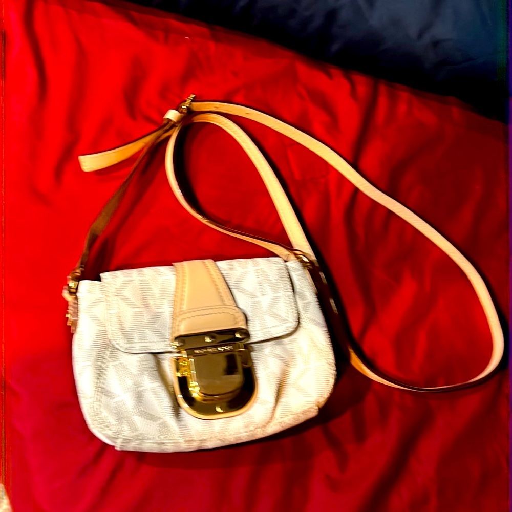 Authentic Michael Kors cross body bag.